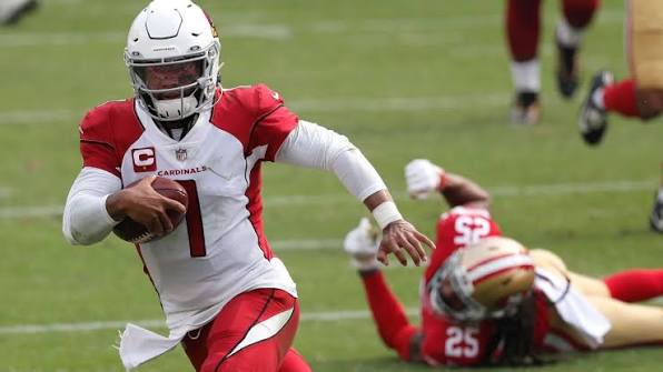 Quarterback scrambling out of the pocket